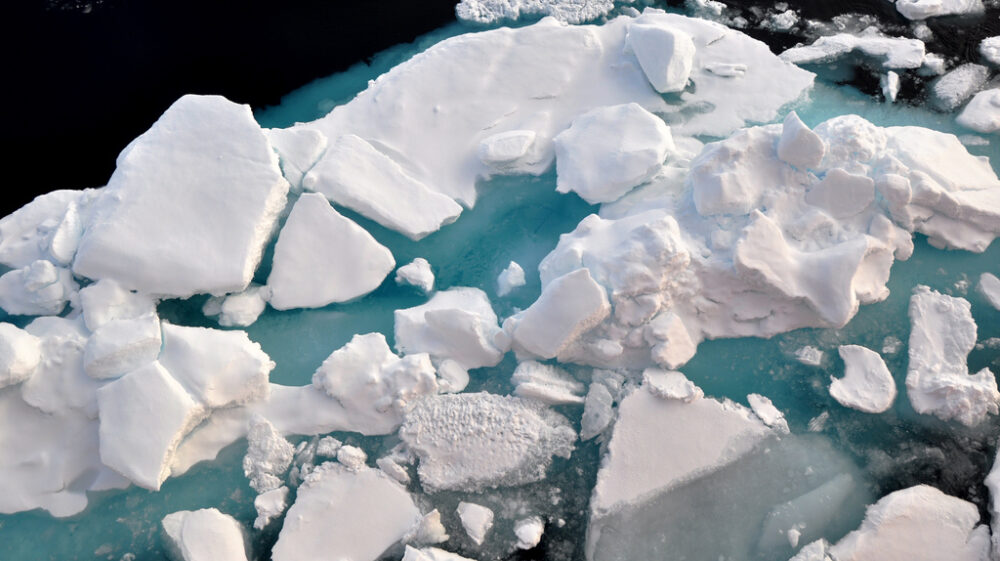 ARCTIC OCEAN - An ice floe slides down the starboard side of the Coast Guard Cutter Healy Aug. 19, 2009.