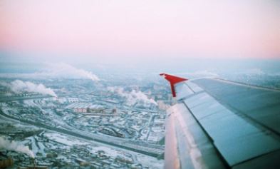 View from an airplane down on a big city