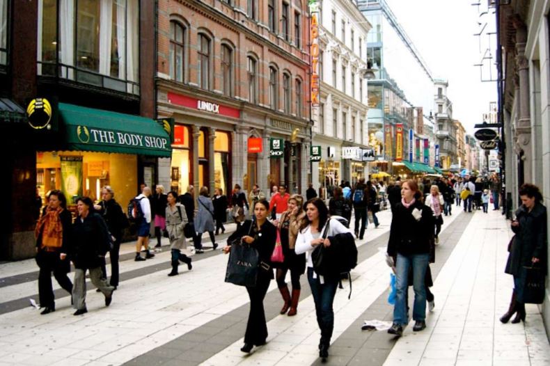 People walking on busy shopping street in Stockholm