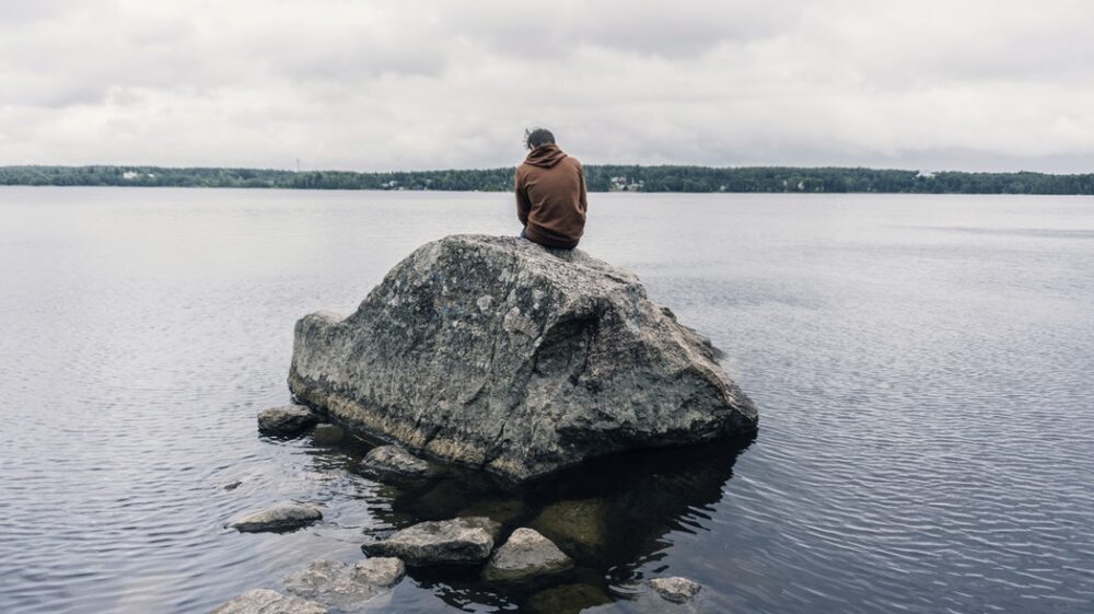 Sitting on a stone looking at the Baltic Sea