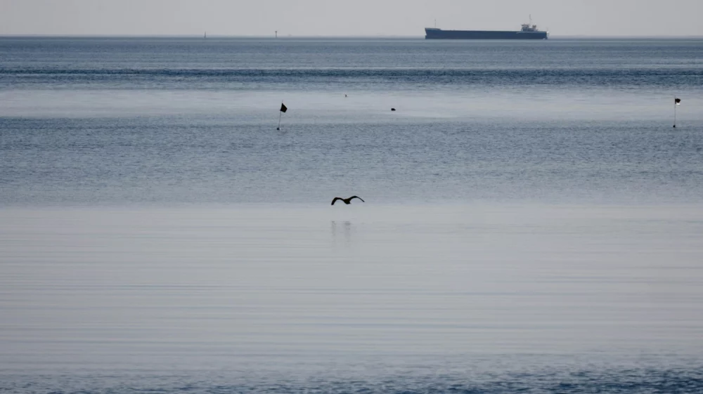 sea with a boat