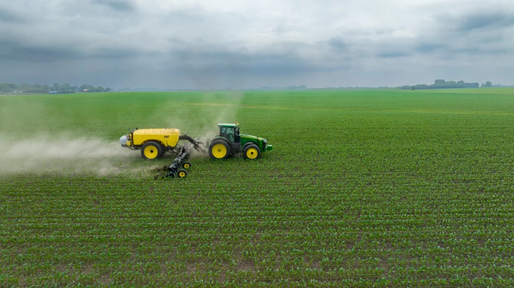 farm machine spraying field