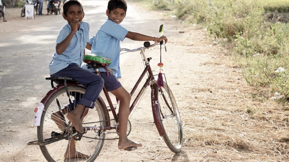 Indian boys on bike