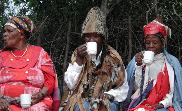 Village elders have a cup of tea in a Tswana village