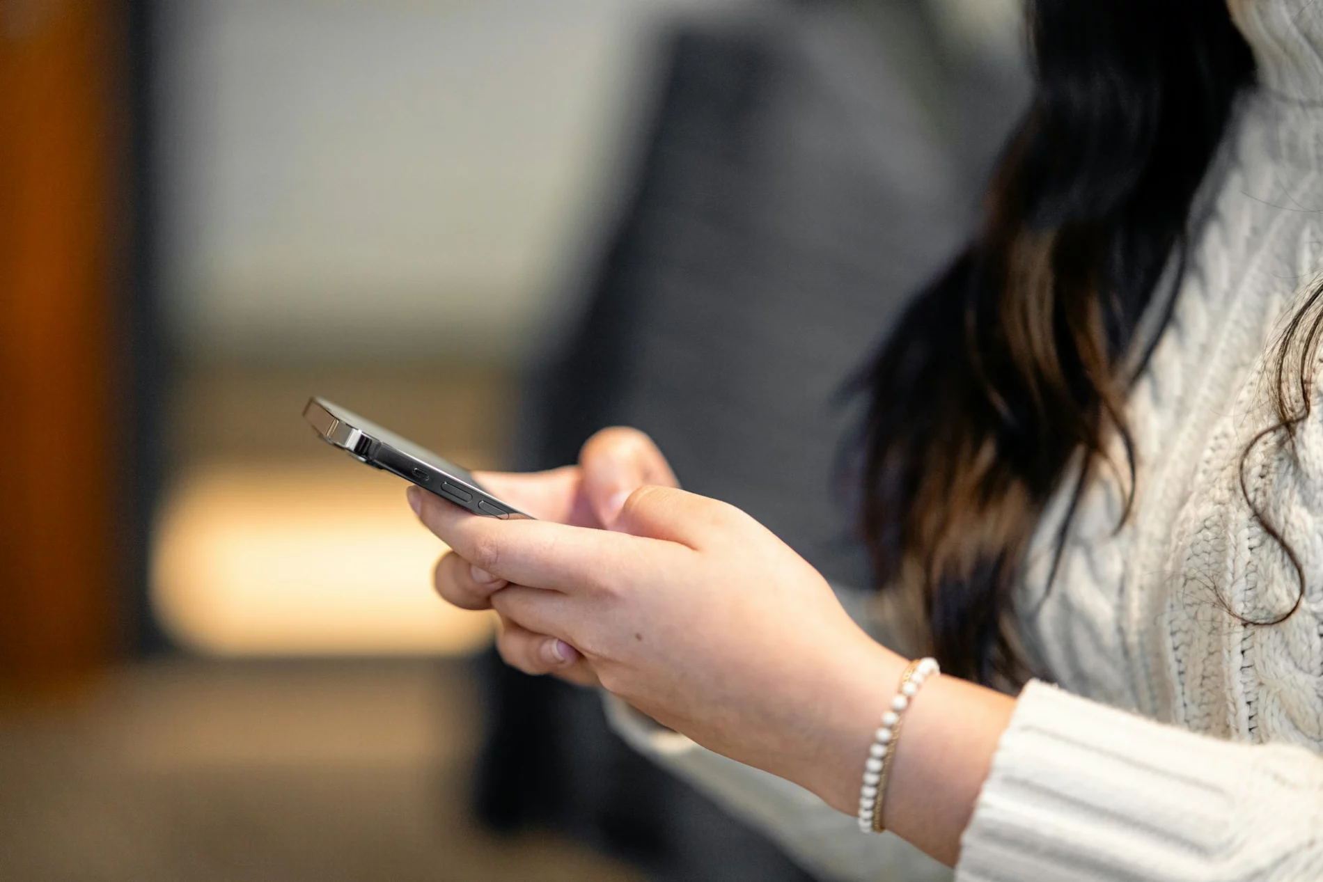 woman holding phone