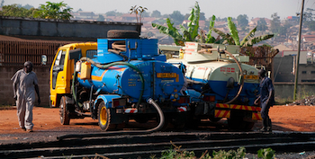 Trucks emptying faecal sludge at Bugolobi Wastewater Treatment Plant in Kampala, Uganda. Photo by Linda Strande.