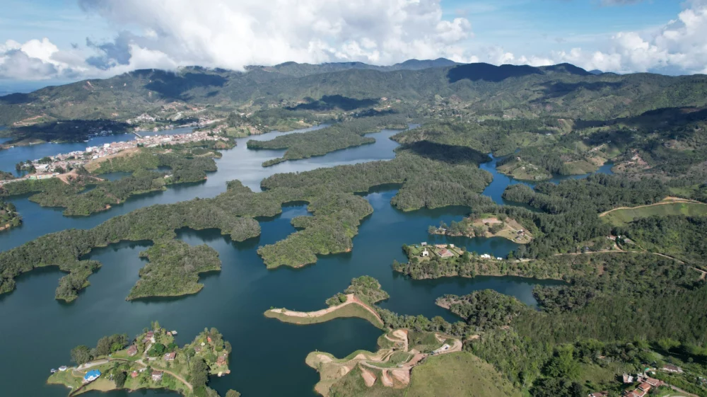 Aerial view of a lake surrounded by mountains