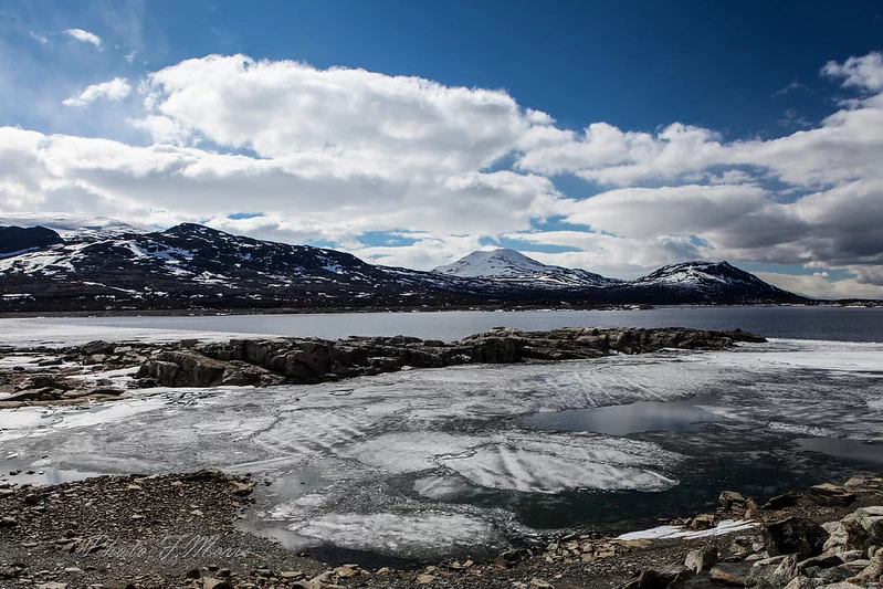 landscape of mountains, rivers, blue sky