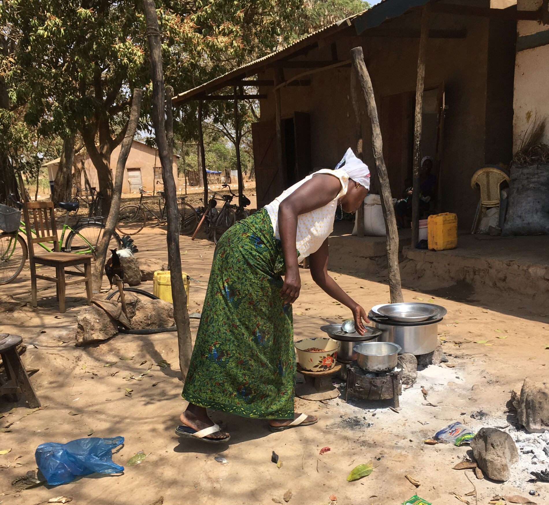 Business woman preparing food in her restaurant i the village