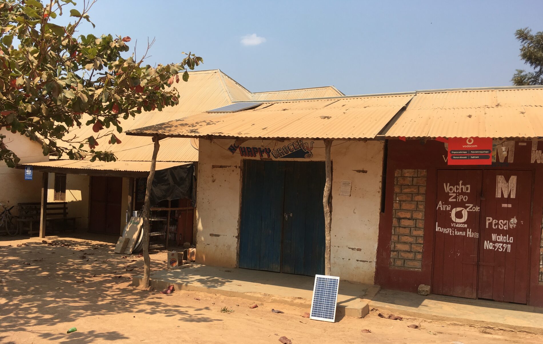 A shop with a small-scale solar power on the roof