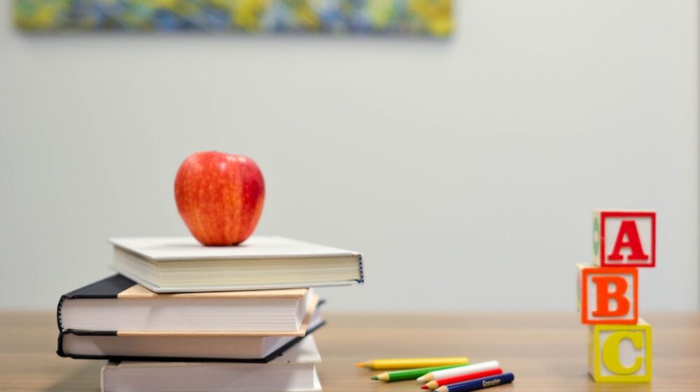 Books, apple, crayons