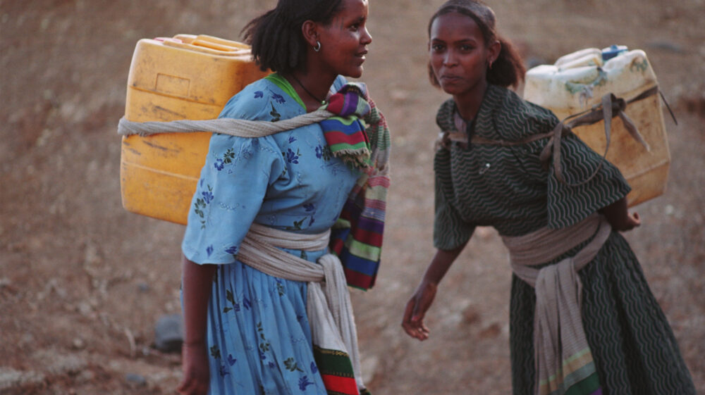 Ethiopian girls carrying water