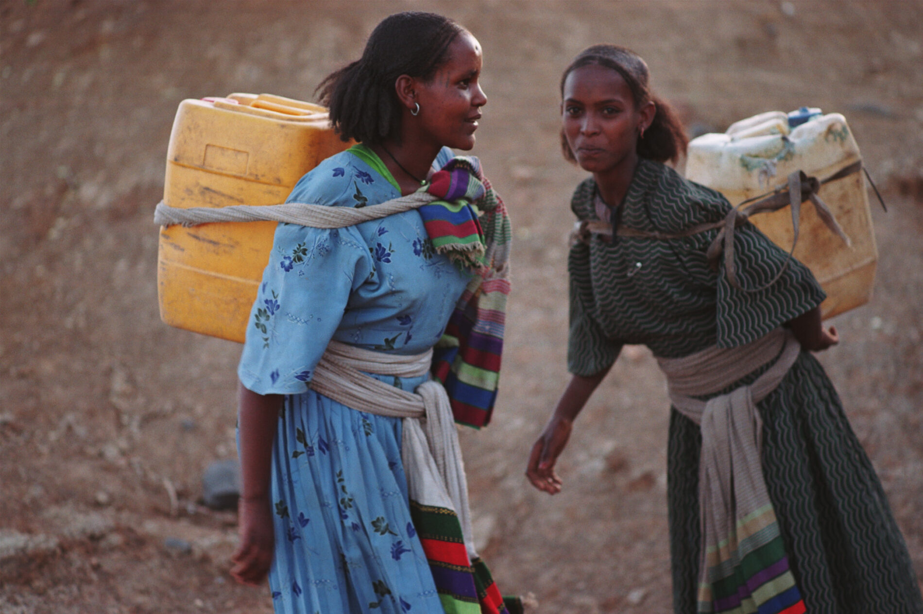 Ethiopian girls carrying water