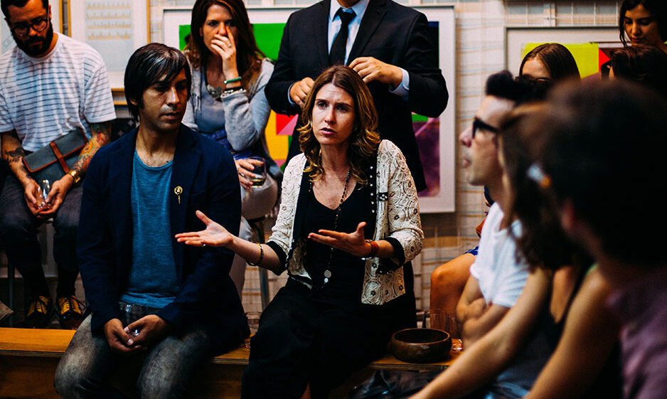 A woman talking in a group