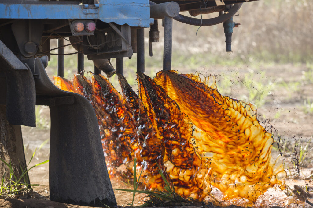Molasses being applied as fertiliser