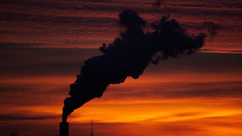 Chimney stack pollution Photo by Sam Jotham Sutharson on Unsplash