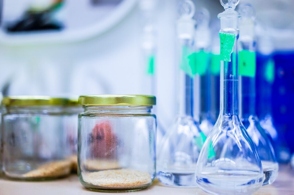 Chemicals in jars on a bench