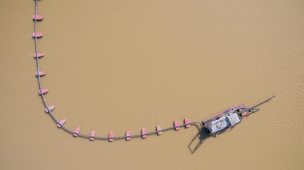 Aerial view, Sand sucker in river, factory plant producing sand materials for construction industry, thailand.