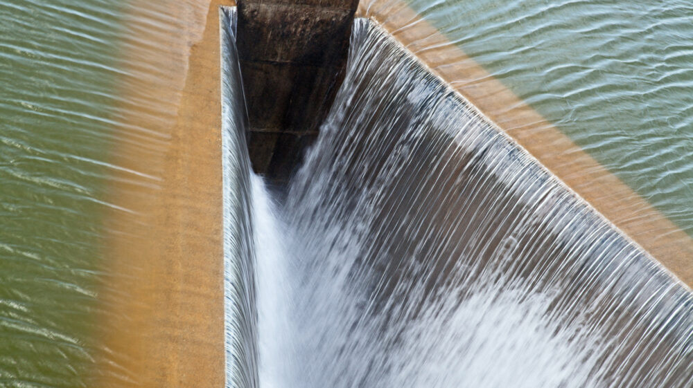 detail of dam, water flowing