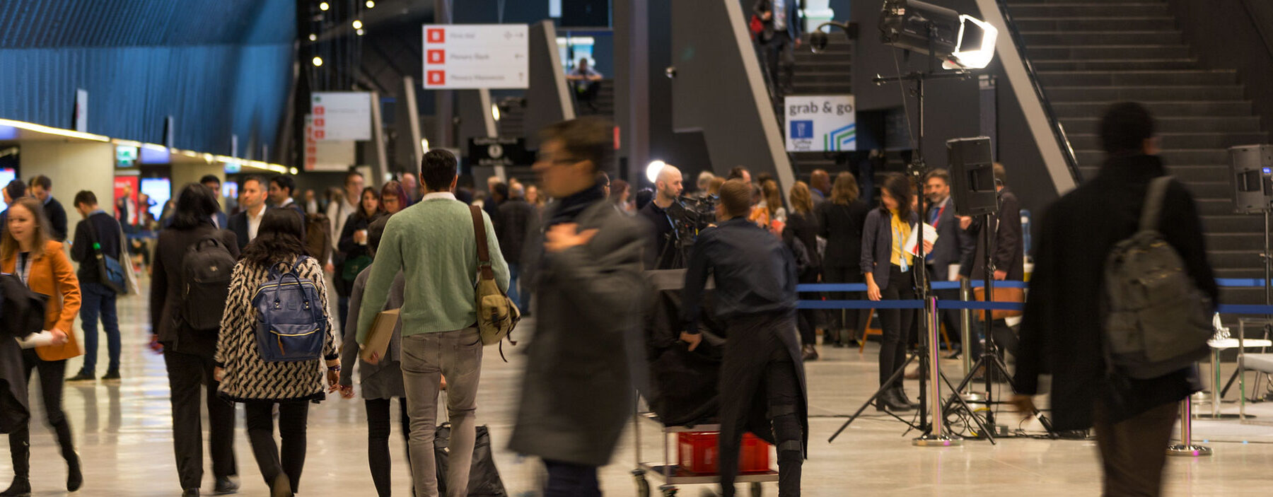A busy building foyer at COP24 in Katowice.