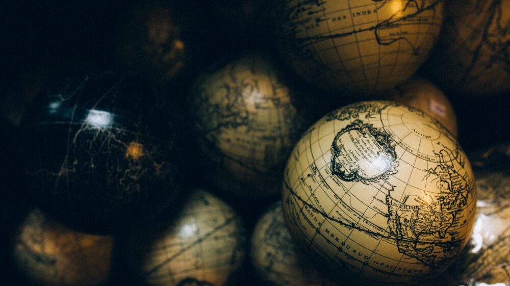 round beige and black globe decors