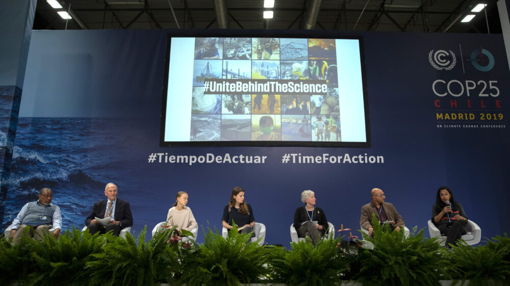 scientists at COP25 on stage with Greta Thunberg and Luisa Neubauer