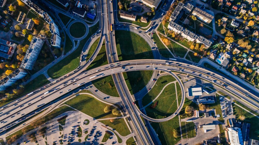 Aerial photograph of a busy road interchange in an urban environment