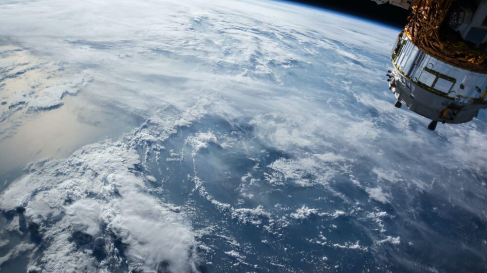 A satellite over clouds
