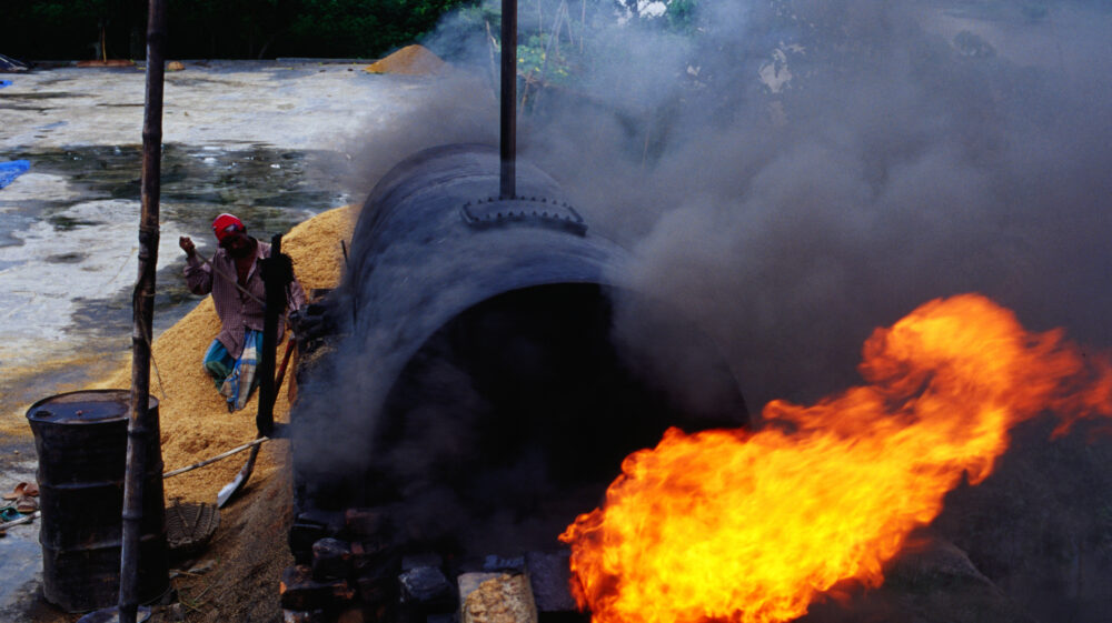 Burning rice husks at a rice mill in Dhaka, Bangladesh.