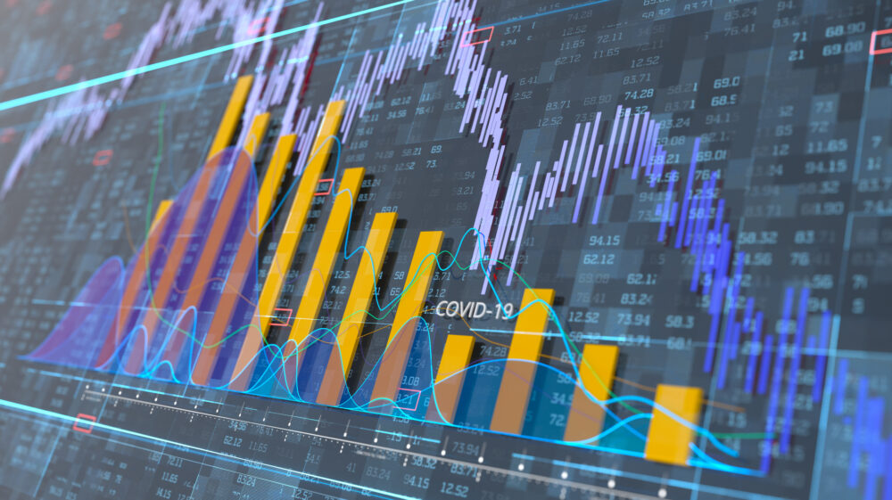 Digital generated image of financial line charts falling down because of coronavirus on blue background