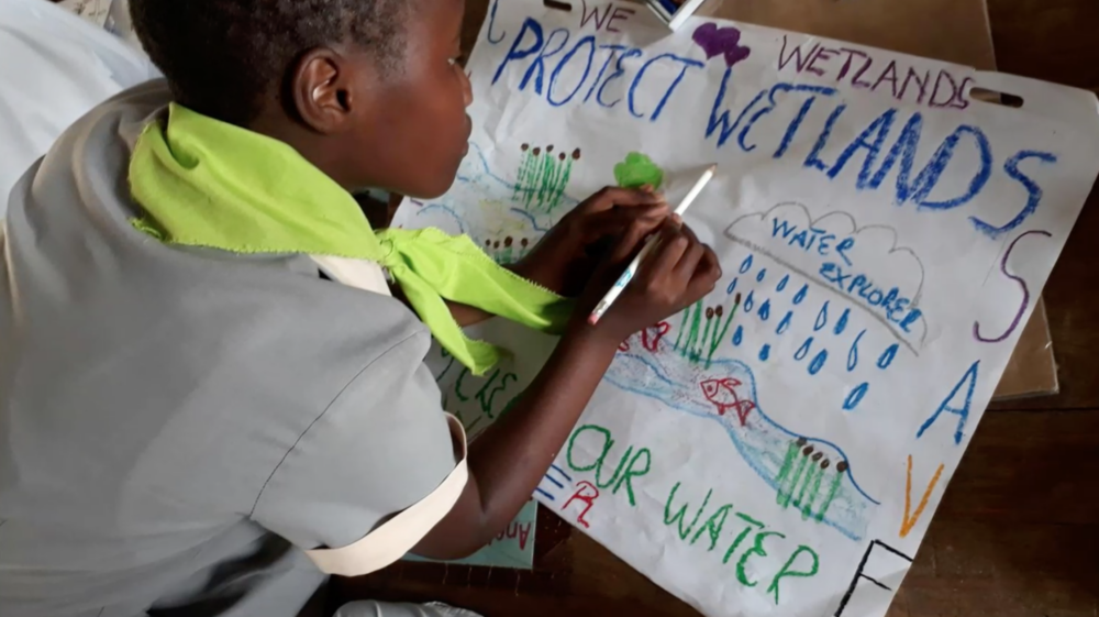 Student drawing on poster