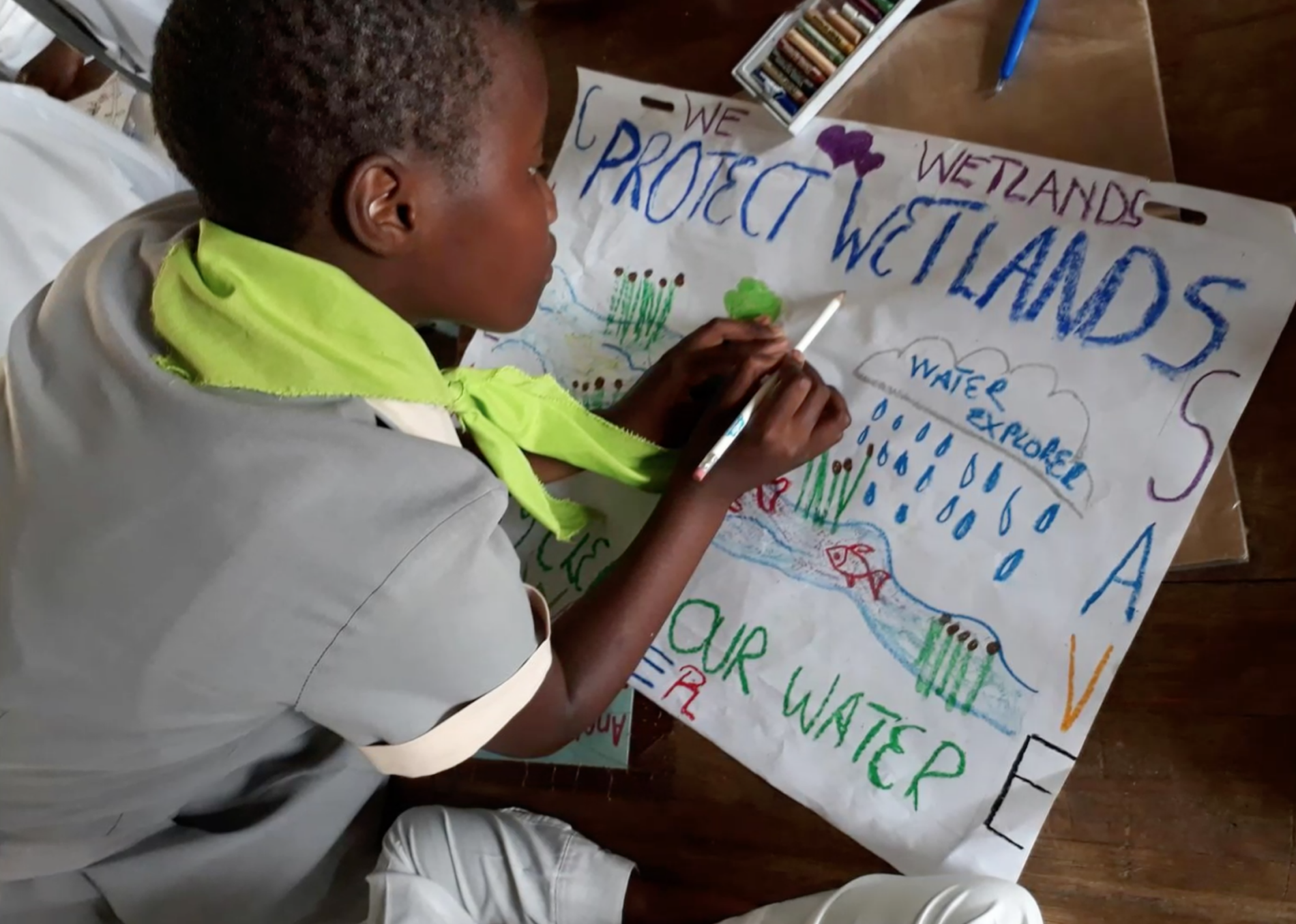 Student drawing on poster