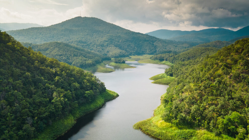 Scenic view of Mae Arb reservoir and mountains against sky, Thoen, Lampang, Thailand