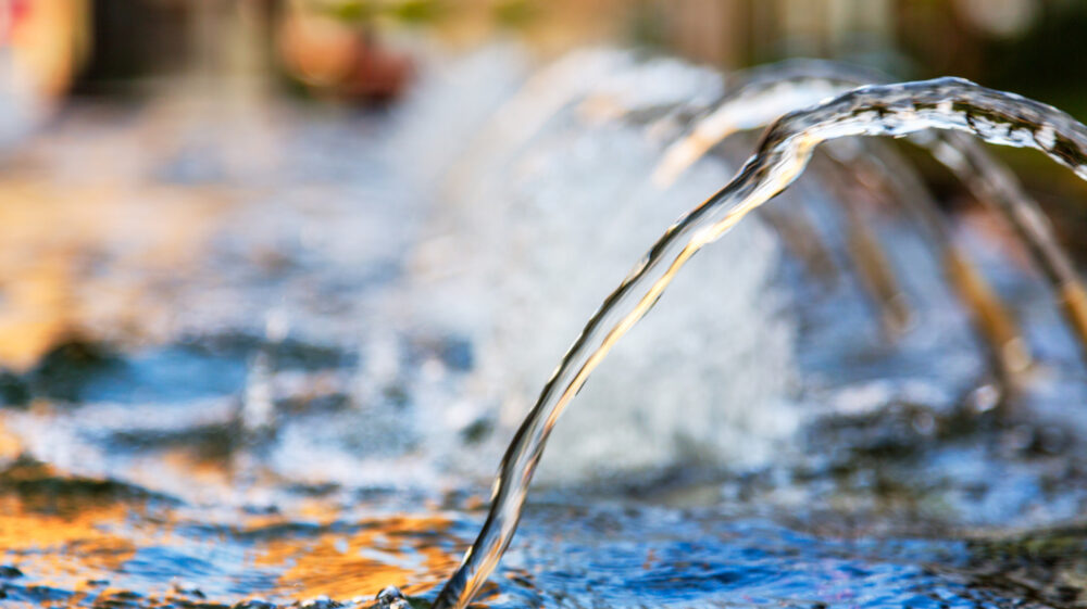 Fountain spraying water in a park