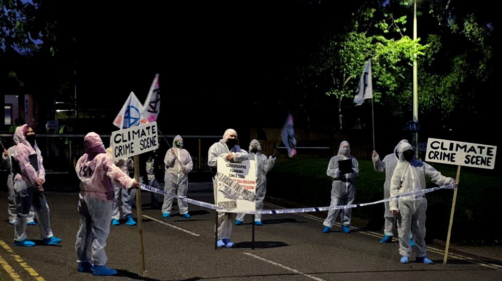 Extinction Rebellion protesters outside the headquarters of J.P. Morgan in Bournemouth, UK protesting about the company's use of fossil fuel