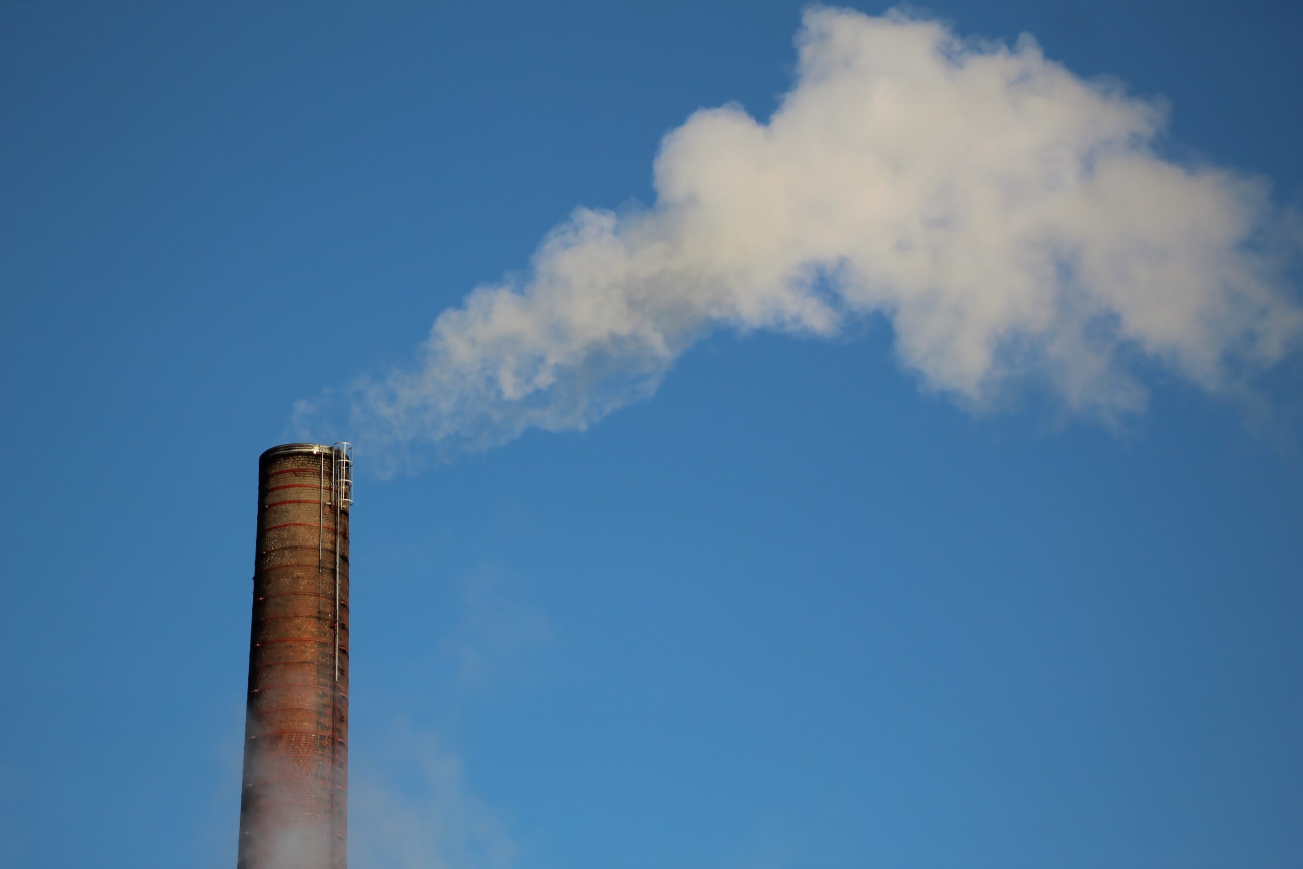 a chimney releasing smoke