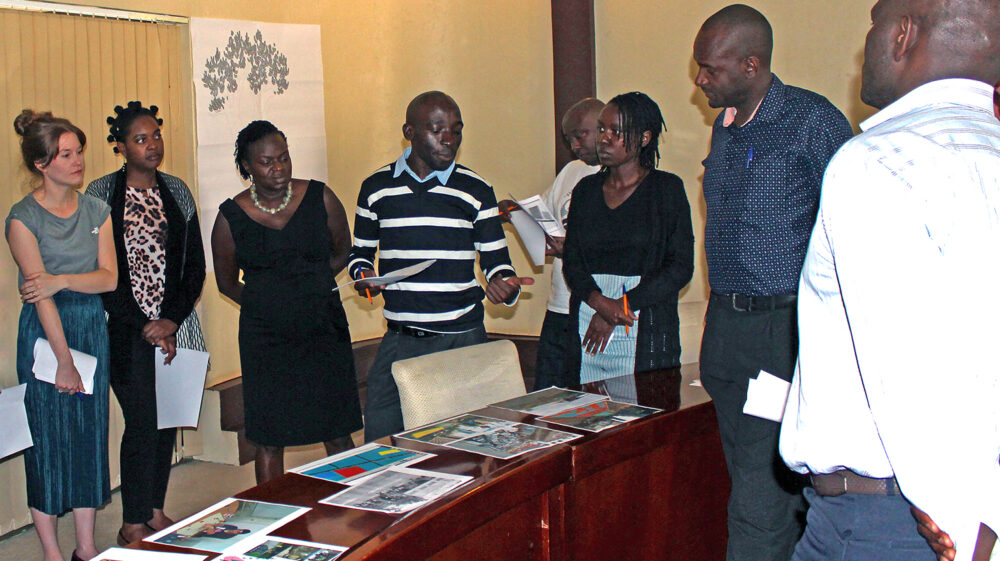 Creative workshop participants sharing solutions to transport issues