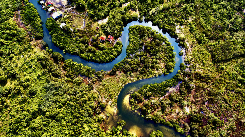 Aerial view of river meandering through Preak Svay Village, Cambodia