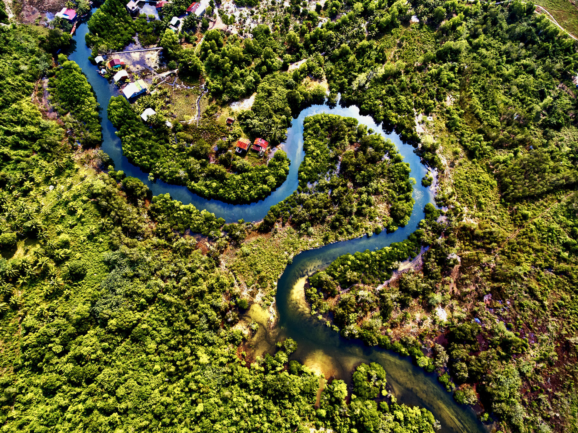 Aerial view of river meandering through Preak Svay Village, Cambodia