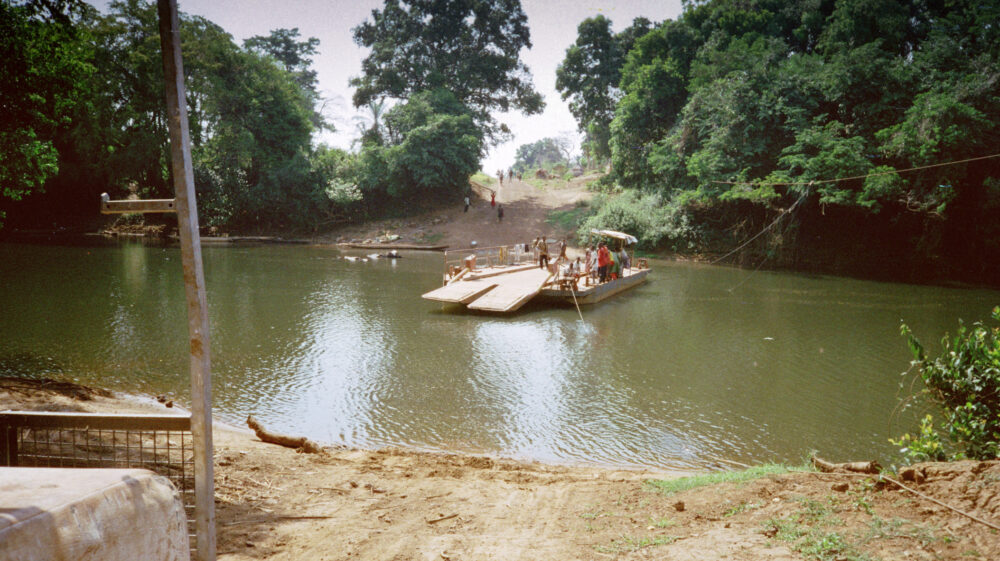 View of jungle river crossing by barge, Central African Republic, 2000