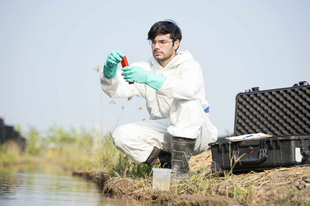 Scientist examining toxic water from a water sample