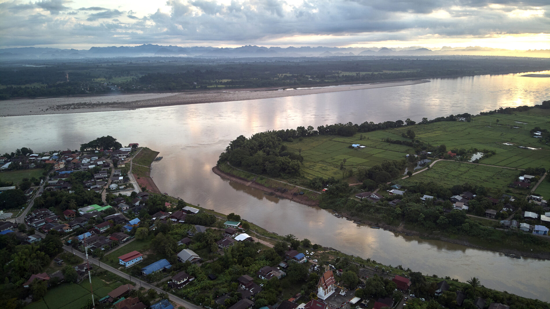 The confluence where the Songkhram River meets the Mekong at Ban Chai Buri, Tha Uthen District, Nakhon Phanom. An unusual drop of the Mekong River and the absence of its backflow in the Songkhram during the rainy season have been observed this year.