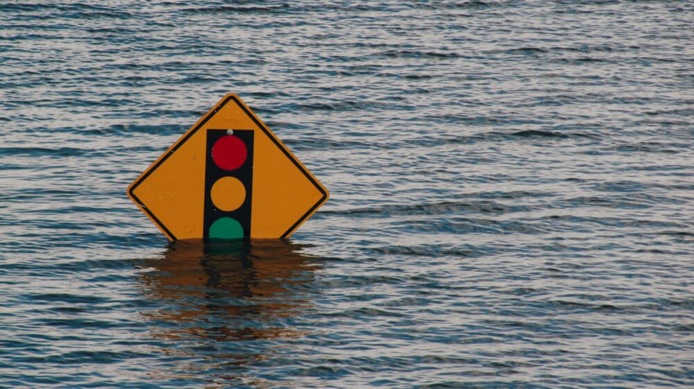 Traffic light sign underwater, Davenport, Iowa, US