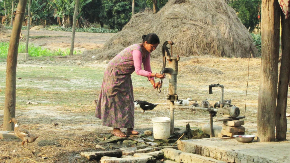 A woman is getting water