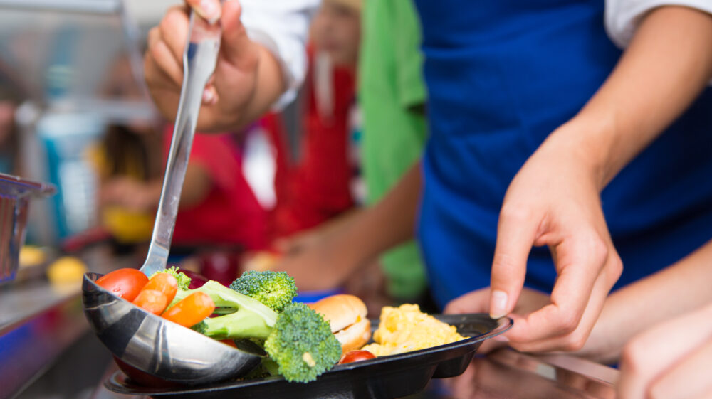 Close-up of vegetables served in school lunch line