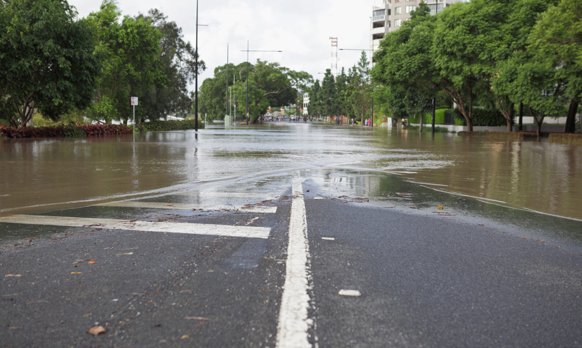 Major road flooded by Brisbane River, Australia