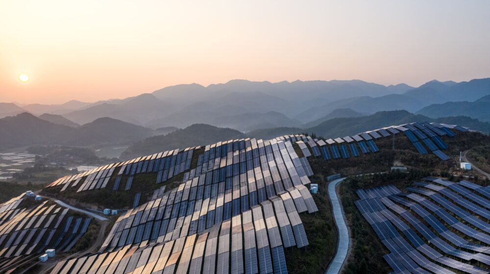 Aerial view of sea of solar panels on hills, Fujian, China