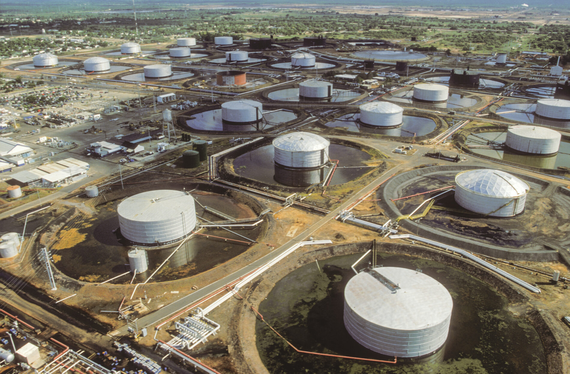 Aerial view of oil processing facility, Cabimas, Venezuela, near Maracaibo Lake, where an enormous deposit of oil discovered in the 1910s made Venezuela one of the world's major oil exporters