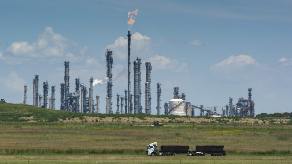 Flames rise from flare stack towers, Mpumalanga, South Africa