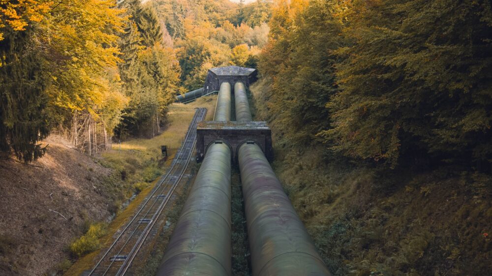 Metal gas pipeline through forest